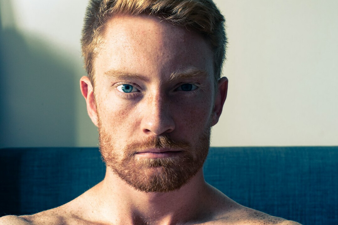 Studio portrait of a man in his thirties with a beard